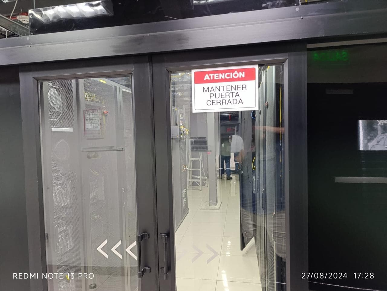 Row-based rack cooling system for data centers